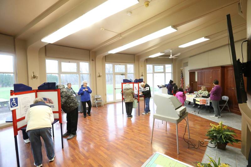 A packed poll is full of voters at the Dickinson House on Tuesday, April 4, 2023 in Oglesby.