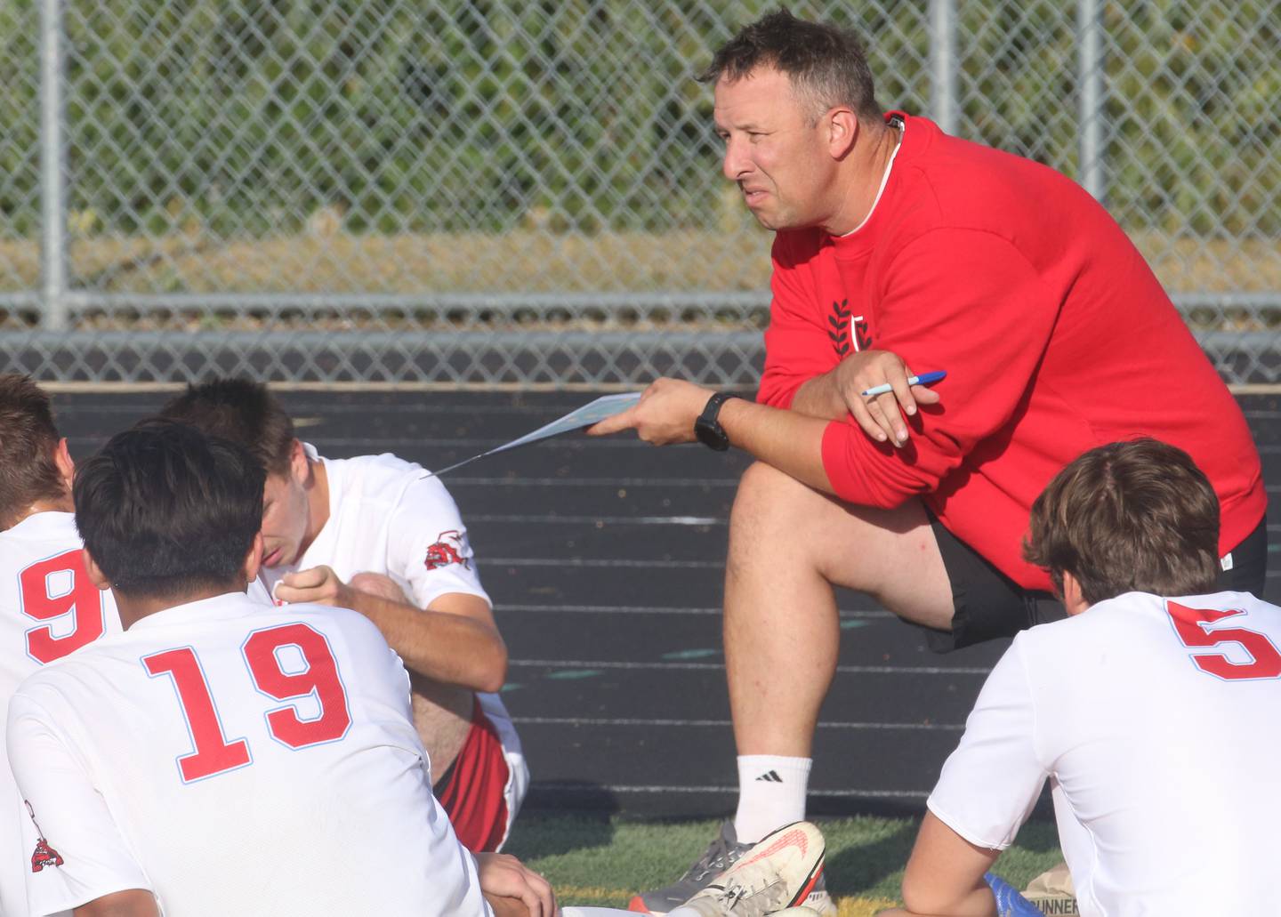 Streator head soccer coach J.T. Huey talks to his team during a timeout while playing Mendota on Monday, Sept. 23, 2024 at Mendota High School.