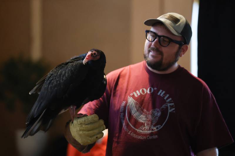 Hoo Haven volunteer Donald Czyzyk holds a 33-year-old rescued Turkey Vulture during a presentation at Four Rivers Environmental Education Center’s annual Eagle Watch on Saturday, Jan 10, 2026 in Channahon.