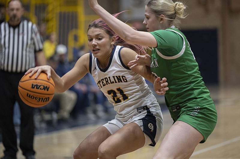Sterling’s Jaelynn James works against Alleman’s Megan Hulke Thursday, Jan. 29, 2026.