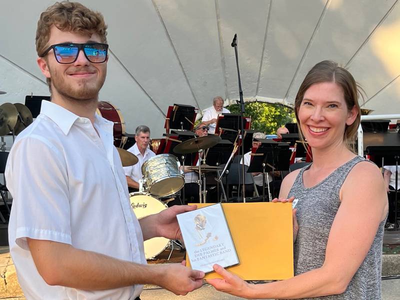 Palmer Family Music Education Scholarship recipient Ben Grych and , Community Foundation Grants and Scholarships Manager Becky Zantout, at a June 2022 DeKalb Municipal Band concert.