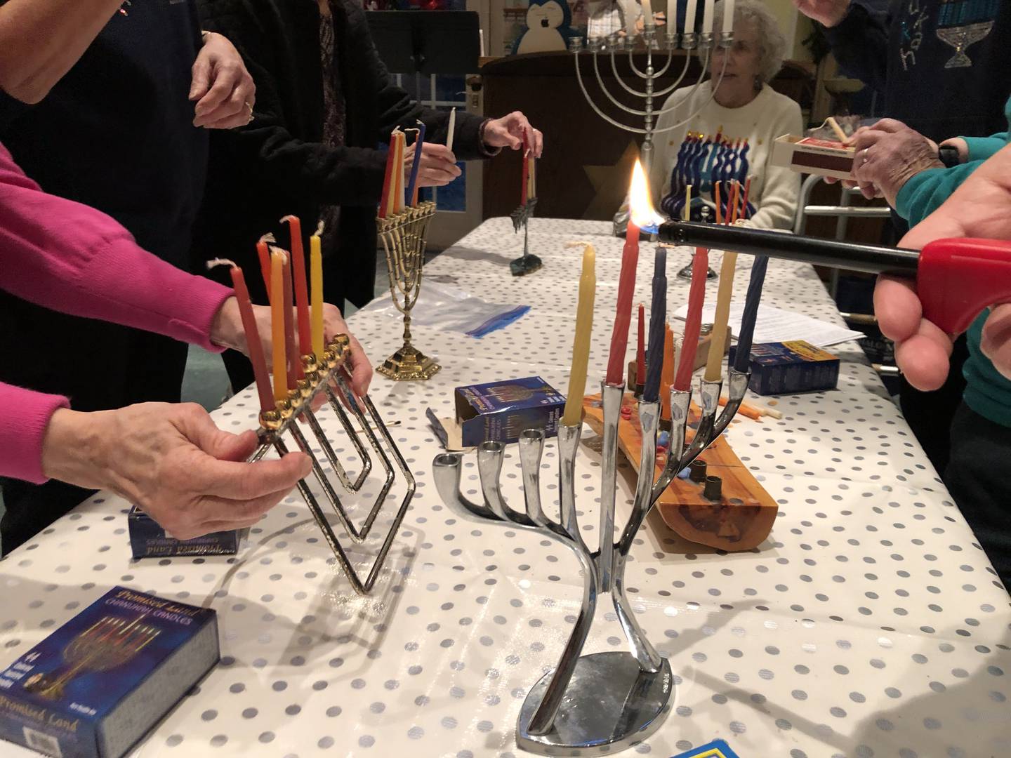 Members of McHenry County's Jewish Congregation were invited to bring and light their family Hanukkah menorahs on Sunday, Dec. 29, 2024. The congregation is now sharing a building with the Tree of Life Unitarian Universalist Congregation in McHenry.
