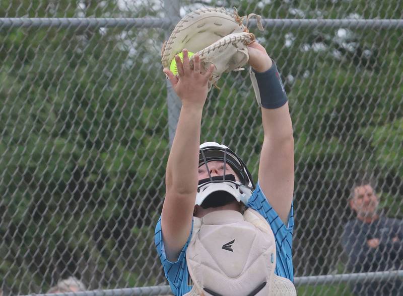 Marquette catcher Kelsey Cuchra squeezes her glove to make an out during the Class 1A Regional title game on Friday, May 22, 2026 at Serena High School.