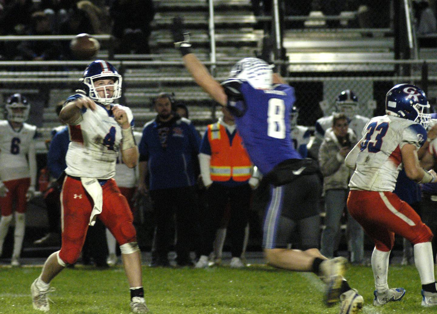 Genoa-Kingston QB  Cody  Cravatta throws a pass by Dixon's  Bene Baratta. Genoa-Kingston traveled to Dixon to take on the Dukes. The game took place on Dixon's Senior Night, October 24th, 2025