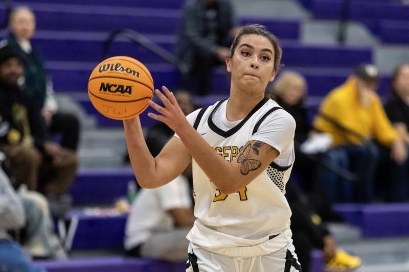 Joliet West's Natalie Clemente looks for an open teammate during a WJOL Girls Basketball Tournament game against Tinley Park at Joliet Junior College on Nov. 18, 2025.