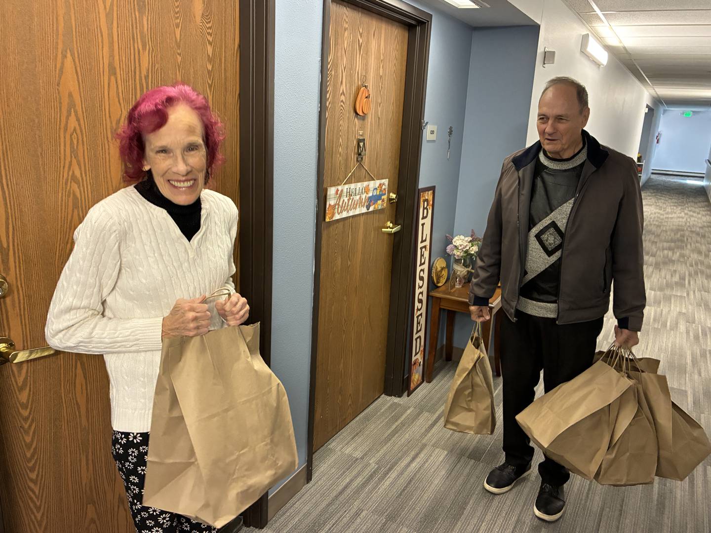 Nanette LaCroix, 69, got her Thanksgiving dinner via Senior Services Associates Inc. of McHenry County and volunteers Steve and Carolyn Runkle on Thursday, Nov. 27, 2025. LaCroix planned to eat her dinner with friends in the common room at her Crystal Lake senior apartments.