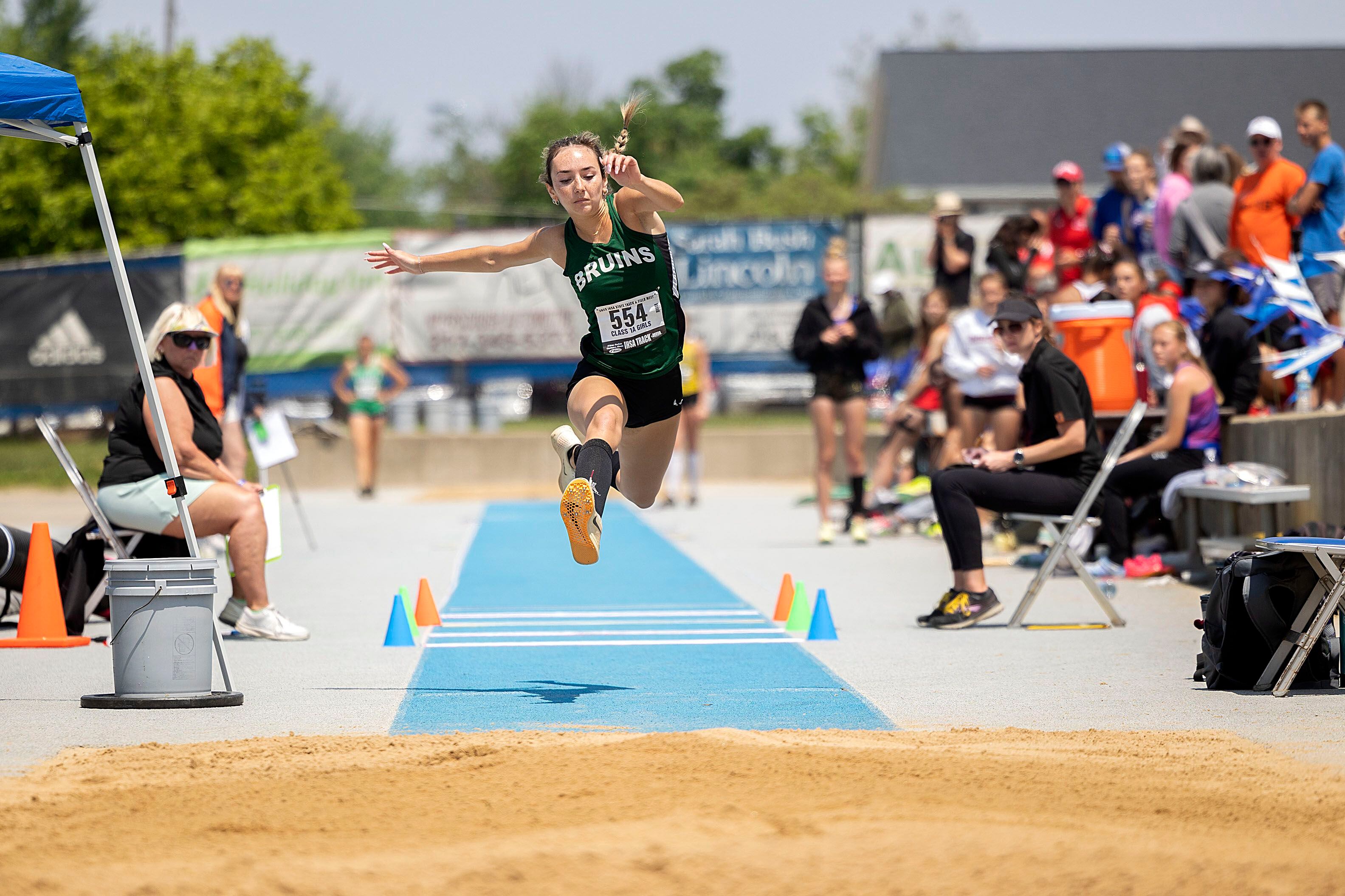 St. Bede’s Anna Lopez makes her attempt in the 1A triple jump Saturday, May 20, 2023 during the IHSA state track and field finals at Eastern Illinois University in Charleston.