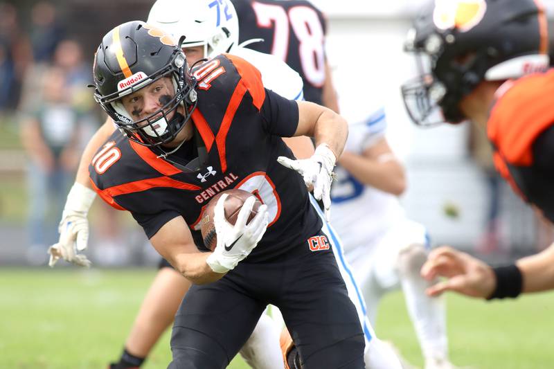 Crystal Lake Central’s Griffin Buehler runs the ball against Burlington Central in varsity football at Crystal Lake Saturday.