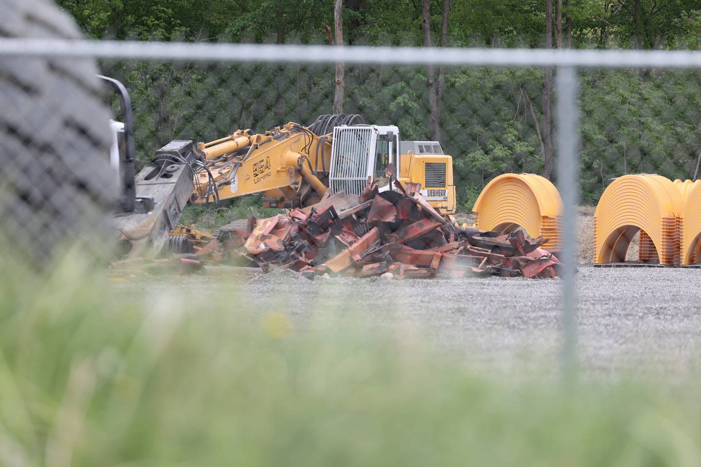 A pile of scrap sits on the site of the proposed cannibas cultivation facility in the Sugar Creek subdivision. Tuesday, May 17 2022, in Joliet.
