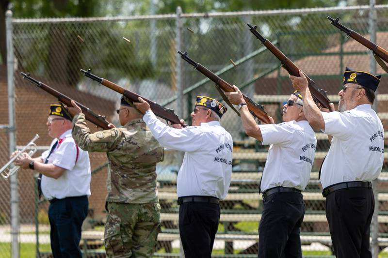 The Peru Honor Guard performs 21-Gun Salute at the annual Memorial Day service on Monday, May 26, 2025 at Washington Park in Peru.