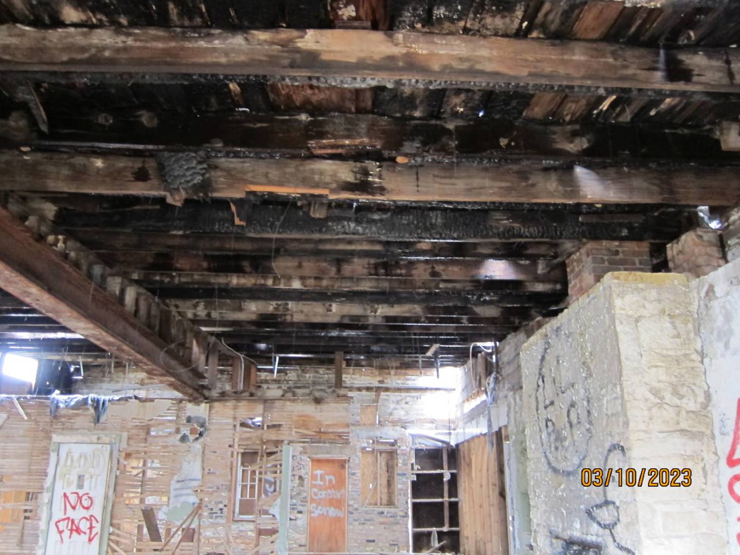 The inside of the circa 1843 limestone blacksmith shop at the former Mill Race property at 4 E. State St., Geneva, shows there had once been a fire that charred the roof. Photos of the building’s condition were presented Tuesday night at a public hearing before the Geneva Historic Preservation Commission. A decision on allowing its demolition is still pending.