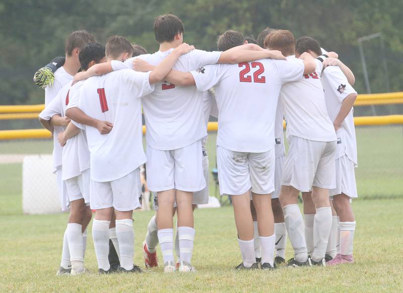 Members of the Earlville boys soccer team huddle before playing Serena on Wednesday, Sept. 3, 2025 at Serena High School.