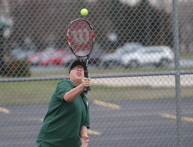 St. Bede's Soloman Zhang plays tennis at the L-P Athletic Complex on Monday, April 3, 2023 in La Salle.