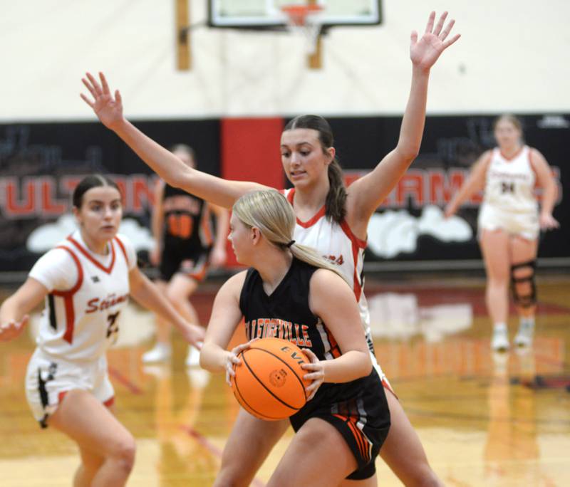 Fulton's Chloe Wilkin (22) guards Milledgeville's Taylor Sarber (3) as the Steamers put on a full-court press during a Friday, Jan. 24, 2025 game at Fulton High School.