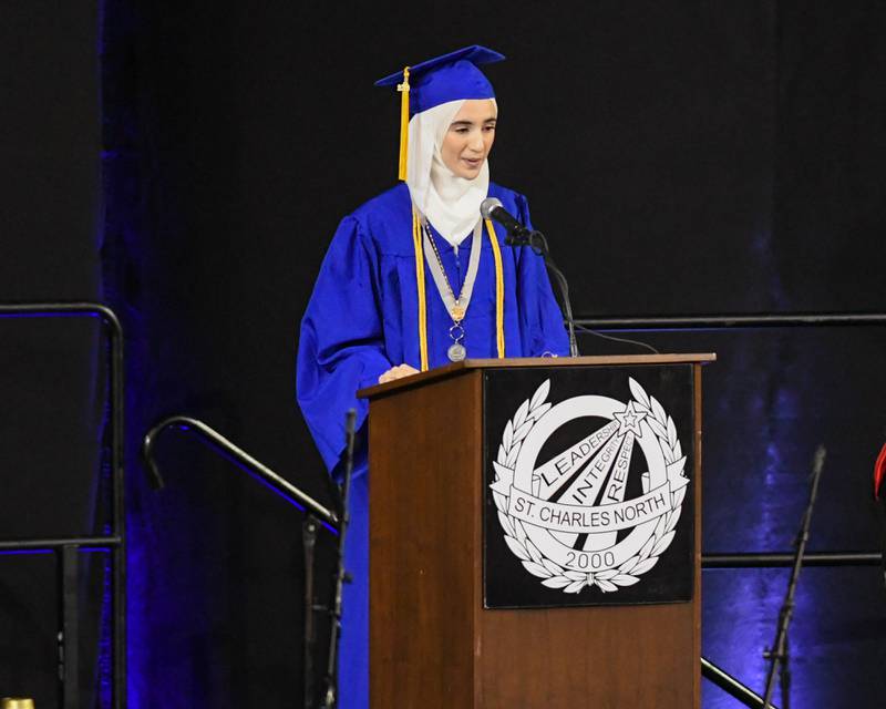 Nour Belhandouz a St. Charles North senior, gives the student address during the graduation ceremony on Monday, May 18, 2026, held at the NIU Convocation Center in DeKalb.
