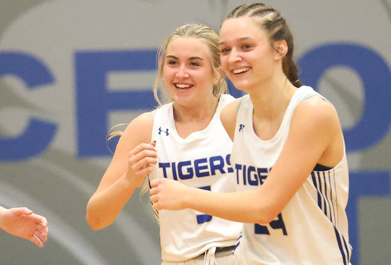 Princeton's Kiyrra Morris reacts with teammate Keighley Davis after hitting the game-winning shot over  Illinois Valley Central in the Princeton High School Girls Basketball Holiday Tournament on Saturday, Nov. 22, 2025 at Princeton HIgh School. The Tigers won in double overtime.