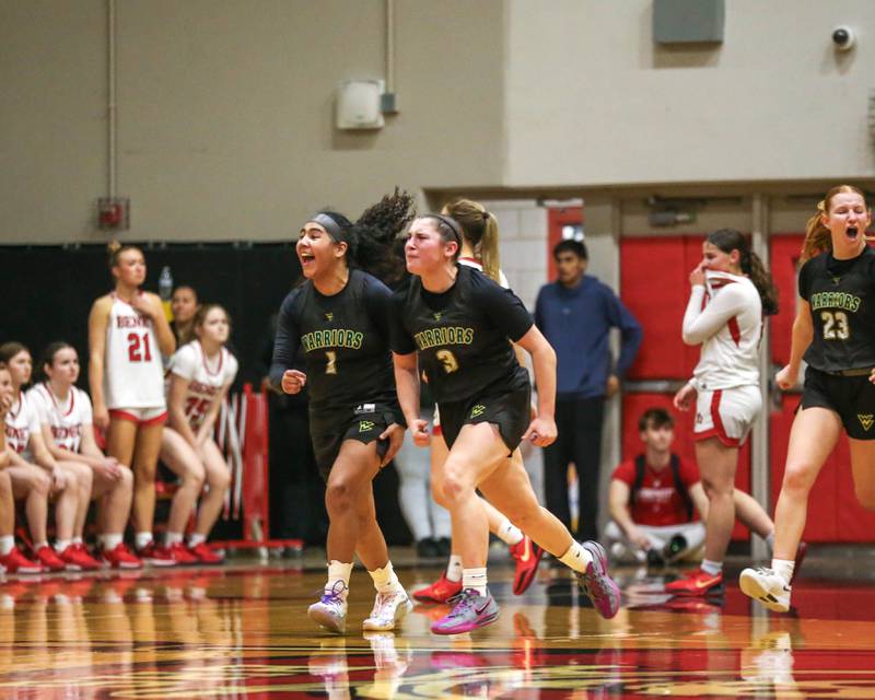 Waubonsie Valley's celebrates their victory over Benet in their Class 4A Bolingbrook Sectional final basketball game between Waubonsie Valley at Benet. Feb 27, 2025 in Bolingbrook.