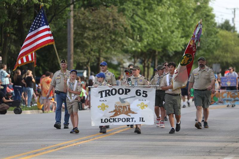Lockport Troop 65 walks the Old Canal Days Parade on Friday June 7, 2024 in Lockport.