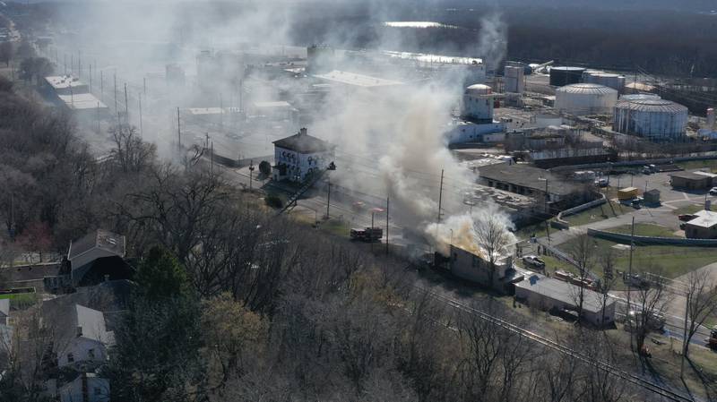 An aerial view of heavy smoke pouring out of the former Platform 31 tavern on Monday, March 24, 2025 on Water Street in Peru. The fire was upgraded to a three-alarm summing ire departments from La Salle, Utica, Mendota, Tonica, Ottawa, Ladd, Spring Valley, Lostant, Cedar Point, Troy Grove and Peru responded to the fire.