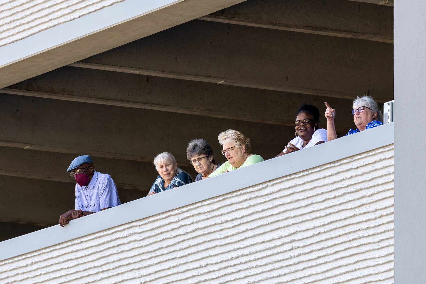 Future casino patrons look out from the parking deck before the Grand Opening Ceremony at Hollywood Casino Joliet, located at 1401 Gateway Blvd., on Aug. 11, 2025.