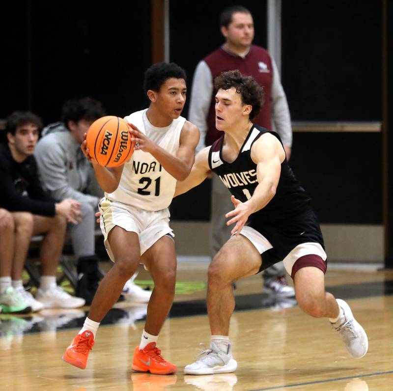 Grayslake North's Will Foley is guarded by Prairie Ridge's Luke Vanderwiel during the 2025 Hoops for Healing tournament basketball game on Wednesday, Nov. 26, 2025, at Woodstock North High School.