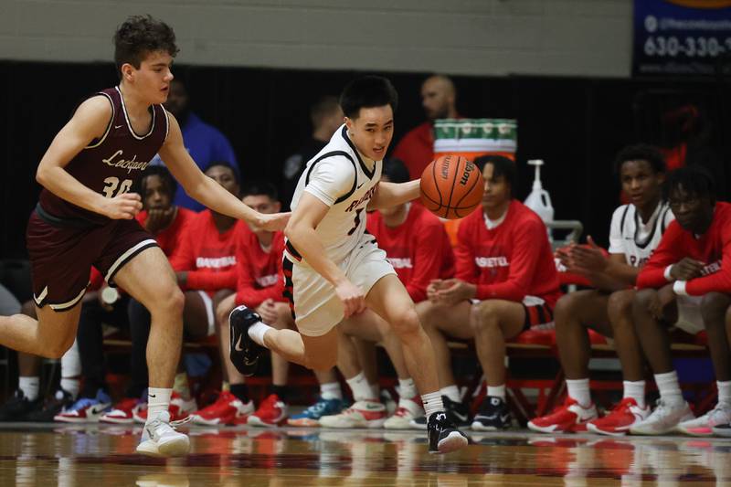 Bolingbrook’s Josh Aniceto takes the ball upcourt against Lockport on Friday, February 10th.
