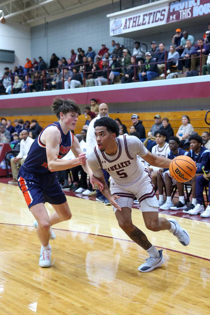 Kankakee's EJ Hazelett brings the ball to the baseline during the Kays' 74-60 victory over Mahomet-Seymour on Tuesday, Dec. 2, 2025.