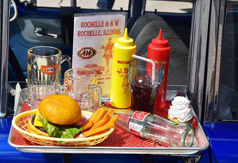 A replica of an A&W Drive-in order is seen on a car in downtown Amboy on Sunday, Aug. 24, 2025, during the Depot Days car show.