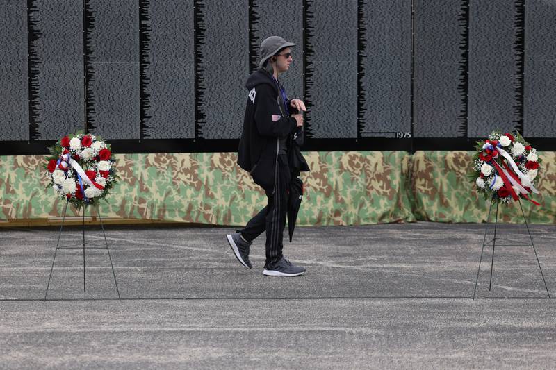 A person walks along the Vietnam Moving Wall on Saturday, July 1st, 2023, in Manhattan.