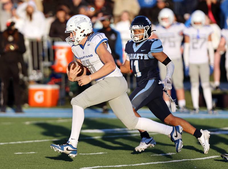 St. Francis' Alessio Milivojevic (11) runs the ball during the boys varsity IHSA 5A semifinal between Nazareth Academy and St. Francis high school in La Grange Park, IL on Saturday, Nov. 18, 2023.