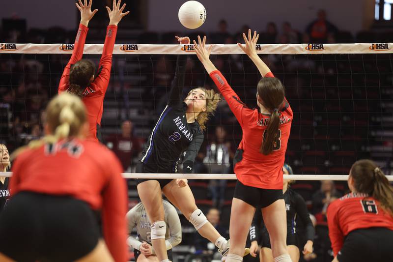 Newman’s Sophia Ely goes for the kill against Norris City-Omaha-Enfield in the Class 1A 3rd place match on Saturday in Normal.