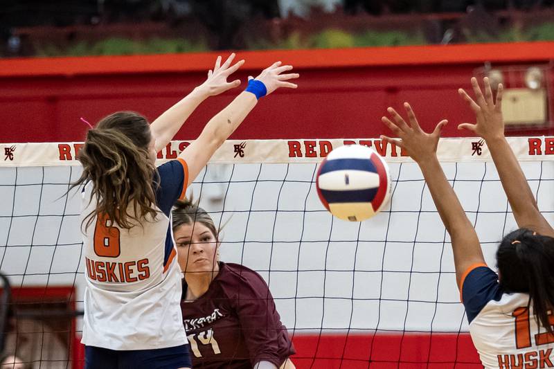 Lockport's Hutsyn Timosciek spikes during a 4A Supersectional girls volleyball game against Oak Park-River Forest at Hinsdale Central on Nov. 10, 2025.