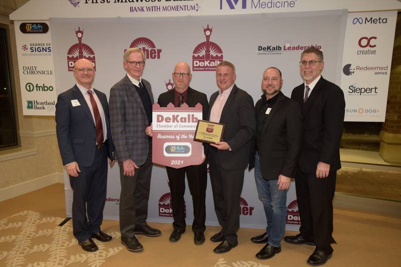 Shawn Lowe accepts the 2021 Business of the Year ward on behalf of 94.9 WDKB radio during the DeKalb’s Annual Celebration Dinner at the Barsema Alumni & Visitors Center on Thursday, Feb. 3, 2022.