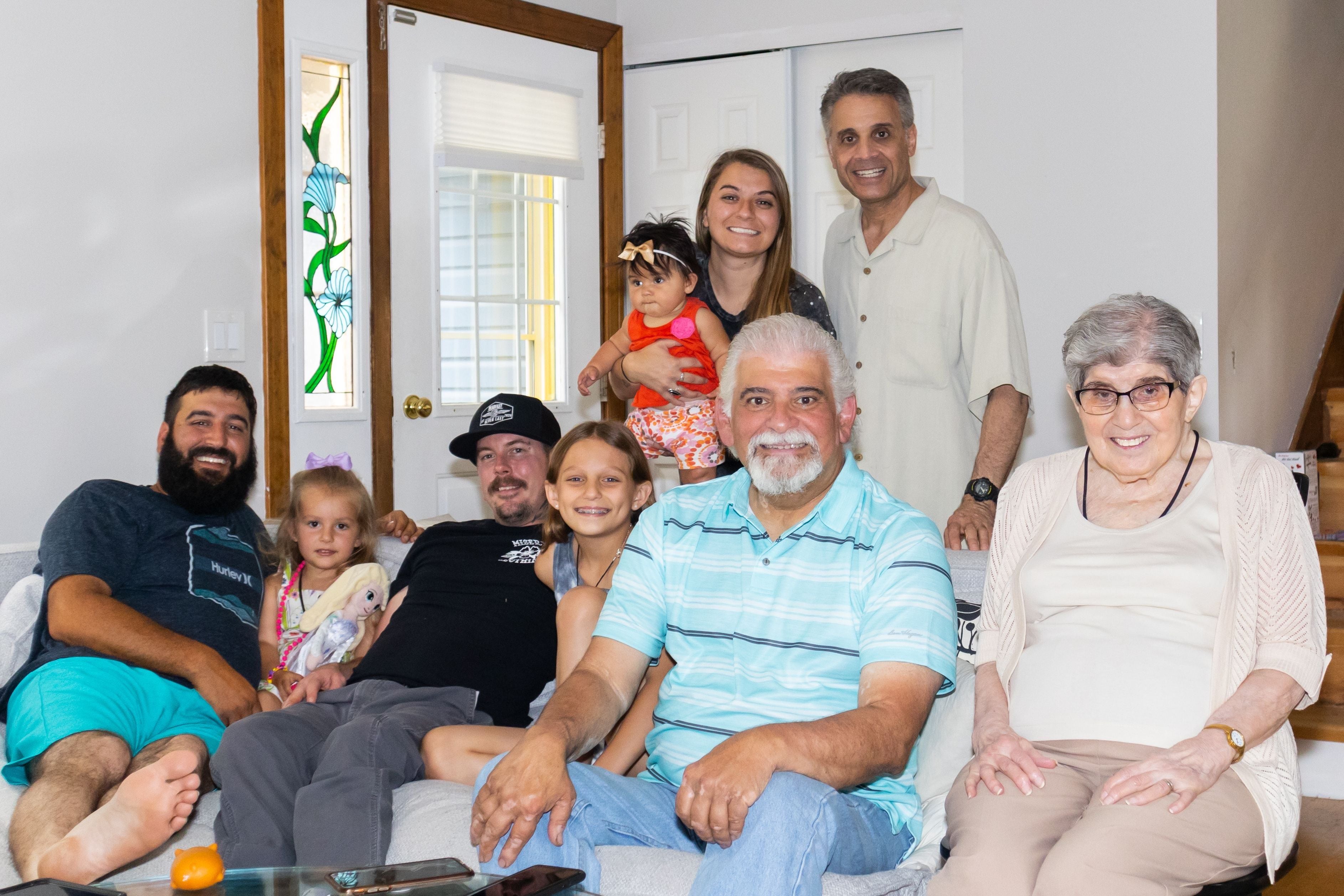 Crystal Lake resident Angelo Pleotis (center), then 64, was seriously injured July 27, 2022, when a car crashed through his garage and into the home itself. Pleotis' family said he may be paralyzed for life now.