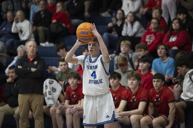 Newman’s Easton Coward puts up a three point shot against Hall Tuesday, Feb. 17, 2026.