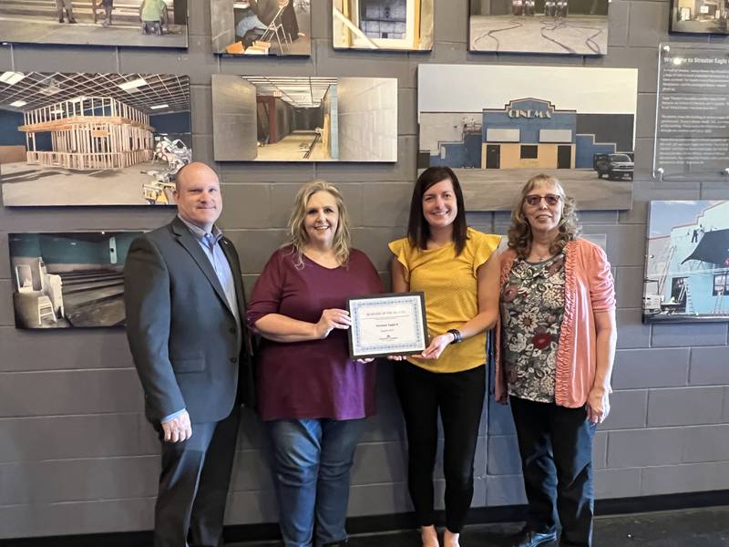 Ben Hiltabrand (Streator Chamber Board), Rachel Rapson (Streator Eagle 6 manager), Courtney Levy (Chamber executive director) and Judy Booze (Chamber ambassador) recognize Streator Eagle 6 as the Chamber's August 2023 Business of the Month.