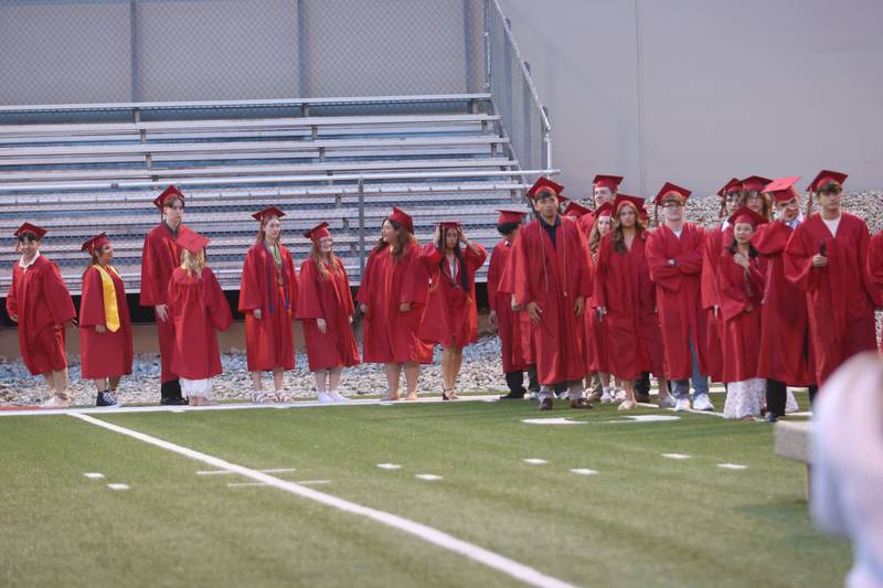 La Salle-Peru Township High School graduates walk to receive their diplomas during the L-P Class of 2026 commencement ceremony on Thursday, May 14, 2026 at Howard Fellows Stadium.