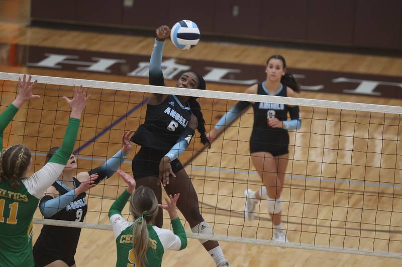 Joliet Catholic’s Heavenly Sarfo powers a shot against Providence on Thursday, Sept. 14, in Joliet.