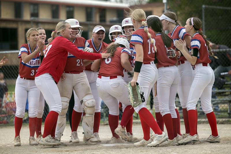Morrison’s Ava Duncan is celebrated after hitting a three-run homer against Fulton Friday, May 22, 2026, at the Class 1A softball regional at Newman High School.