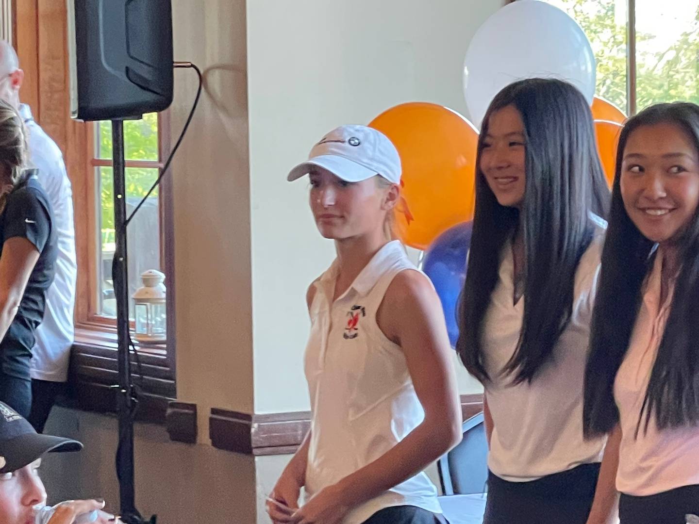 St. Charles East's Emily Charles (left) earned medalist honors at Monday's Class 2A Huntley Sectional.