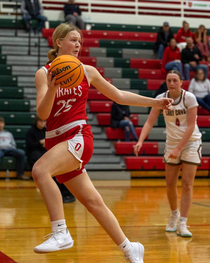 Libby Muffler (25) of Ottawa saves ball from falling out of bounds on Wednesday, December 17, 2025 at Sellet Gymnasium in LaSalle.