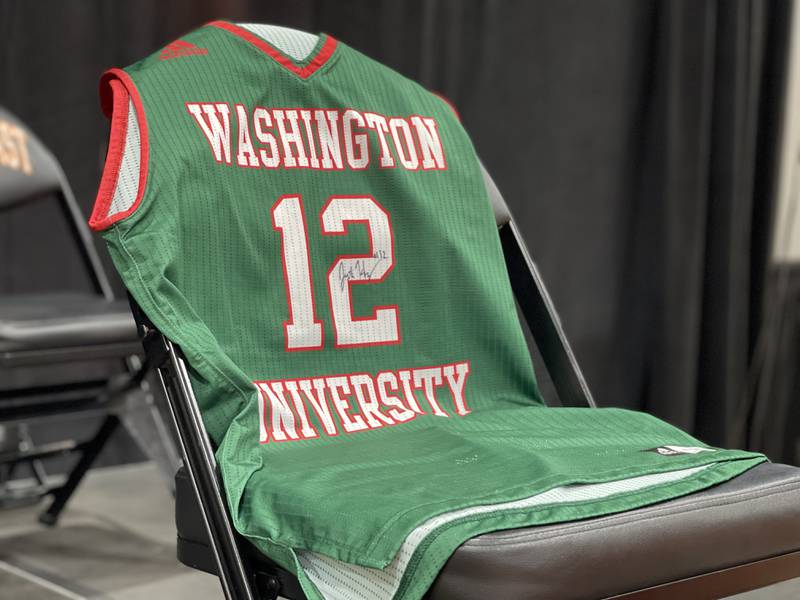 Justin Hardy’s collegiate basketball jersey featured during his celebration of life hosted at St. Charles East on Friday.