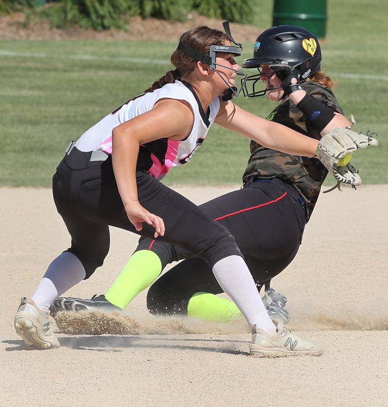 Kishwaukee Valley Storm's Clara Vivirito takes the throw on a steal attempt Friday, June 24, 2022, during their 12u game against the Midwest Aftershock in the 22nd annual Storm Dayz tournament at the Sycamore Community Sports Complex.