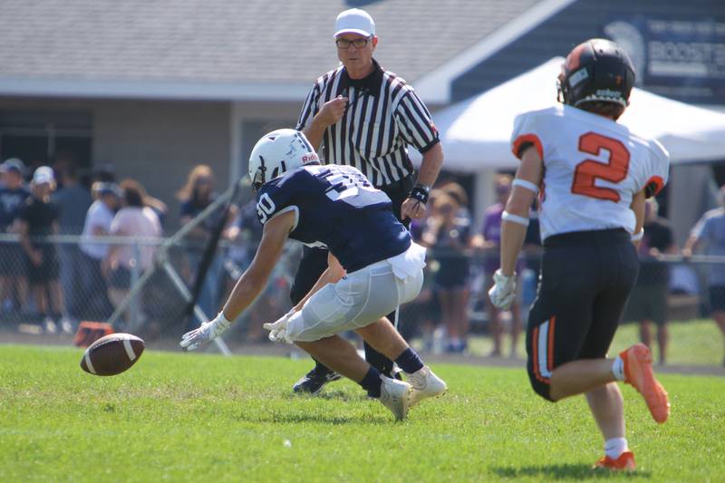 Cary - Grove's Alex Schuppe looks to recover the ball against McHenry's James LaRose on Saturday, Sept. 17,2022 in Cary.