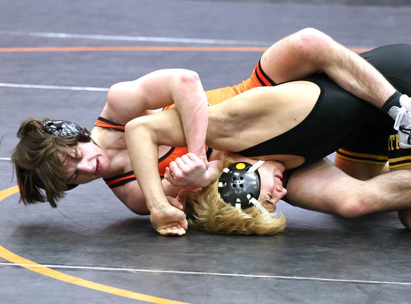 St. Charles East’s Dom Munaretto controls Dominick Marre of Glenbard North during their 113 pound championship match Saturday, Feb. 3, 2024 in the Class 3A regional at DeKalb High School. Munaretto won the match with a 9-5 decision.