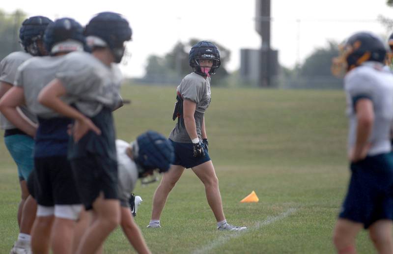 Oswego East’s Lincoln Ijams lines up for a play during a joint practice with Sterling and Glenbard South football teams on Tuesday, July 15, 2025 in Oswego.