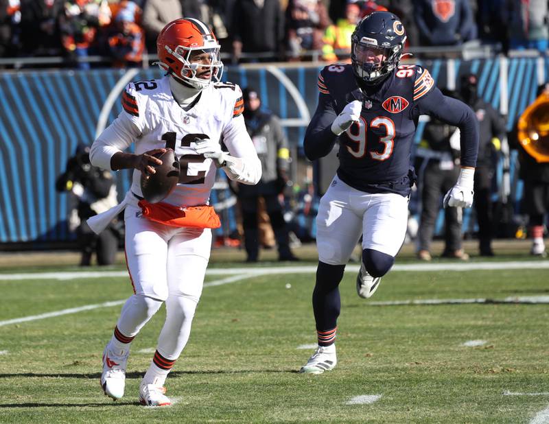 Chicago Bears defensive end Joe Tryon-Shoyinka pressures Cleveland Browns quarterback Shedeur Sanders during their game Sunday, Dec. 14, 2025, at Soldier Field in Chicago.