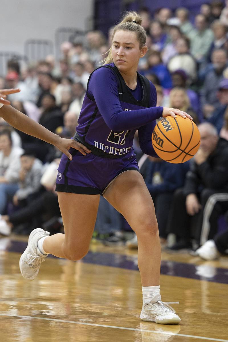Dixon's Reese Dambman makes a pass down low against Byron Friday, Dec. 27, 2024, during the Dixon Girls KSB Holiday Basketball Classic.