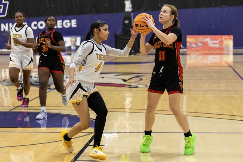 Tinley Park's Grace Stachowicz posts-up before taking a shot during a WJOL Girls Basketball Tournament game against Joliet West at Joliet Junior College on Nov. 18, 2025.