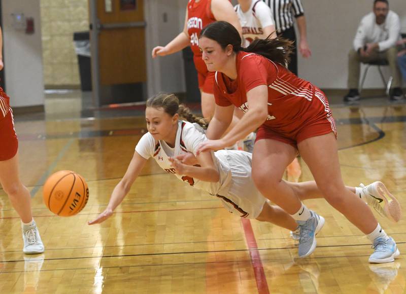 Forreston's Tenlei Patterson (3) dives for the ball as Oregon's Avery Kitzmiller follows during a Saturday, Jan. 3, 2026 game at Forreston High School.